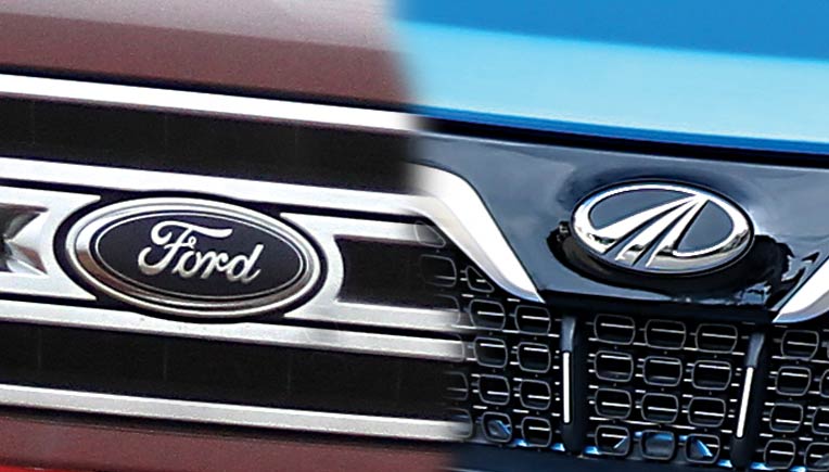 M&M at Range Breakout with volume spurt, but lacks momentum